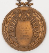 IAN BROWNE'S 1962 BRITISH COMMONWEALTH GAMES IN PERTH, BRONZE WINNER'S MEDAL, with chain, "1962 VII British Empire and Commonwealth Games/Perth/Western Australia", engraved on reverse "Cycling/1000 Metres/Sprint/I.S. Browne/Australia", 58mm diameter. Very - 3