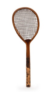 A rare 1870s lop-sided tennis racquet&nbsp;by Richard Daft of 1 Lister Gate, Nottingham; with original gut stringing and remnant cork handle. The cross stringing is overstrung and inter-looped with a second string. Length: 67cm. Provenance: Manfred Schotten, 
