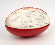 A Ross Faulkner MATCH 'native brand' football in South Melbourne - Swans colours, circa mid-1980s, signed by greats including Graham Teasdale, Barry Round, Terry Daniher, Terry O'Neill, Wayne Evans, Ricky Quade, Ian Stewart, Max Robertson, Gary Brice, and
