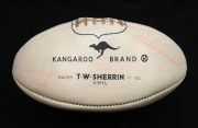 A T.W.Sherrin Kangaroo Brand white ball signed by SOUTH MELBOURNE - SWANS players, including Fred Goldsmith, Ron Clegg, Peter Bedford, Bob Pratt, Laurie Nash, Graham Teasdale, Hughie McLaughlin Snr., etc.