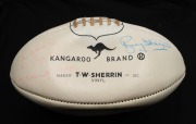 A T.W.Sherrin Kangaroo Brand white ball signed by SOUTH MELBOURNE - SWANS players, including Fred Goldsmith, Ron Clegg, Peter Bedford, Bob Pratt, Laurie Nash, Graham Teasdale, Hughie McLaughlin Snr., etc. - 2
