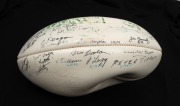 A Kookaburra white football, titled 'SOUTH MELB. PAST PLAYERS and OFFICIALS ANNUAL MEETING 1985' with signatures including Kevin Doolan, Jim Kennelly, Jeff McGee, Jack Lugg, Peter Tippett, Ian Tampion, Alan Miller, Tom Crane and many others. - 2