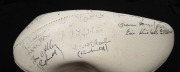 A Kookaburra white football, titled 'SOUTH MELB. PAST PLAYERS and OFFICIALS ANNUAL MEETING 1985' with signatures including Kevin Doolan, Jim Kennelly, Jeff McGee, Jack Lugg, Peter Tippett, Ian Tampion, Alan Miller, Tom Crane and many others. - 4