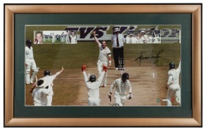 "BREAK THROUGH SHANE WARNE - THE WORLD RECORD" display celebrating Shane Warne's 533rd Test Wicket surpassing the world record then held by Muralitharan; signed by Warne and accompanied by a PWC CofA, numbered 19/350. Framed and glazed 48 x 77cm overall.
