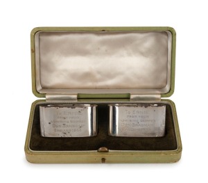 1948 AUSTRALIAN TOUR TO ENGLAND: A cased pair of silver napkin rings presented by Don Bradman to Ernie Toshack, both engraved "TO ERNIE FROM YOUR ADMIRING SKIPPER DON BRADMAN, ENGLAND 1948". The case 16cm wide.