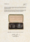 1948 AUSTRALIAN TOUR TO ENGLAND: A cased pair of silver napkin rings presented by Don Bradman to Arthur Morris, both engraved "TO ARTHUR FROM YOUR ADMIRING SKIPPER DON BRADMAN, ENGLAND 1948". Accompanied by a letter of authenticity signed by Arthur Morris - 2