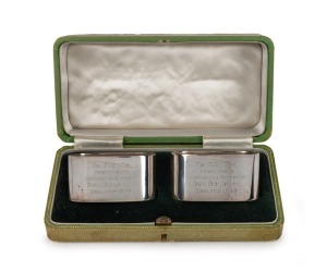 1948 AUSTRALIAN TOUR TO ENGLAND: A cased pair of silver napkin rings presented by Don Bradman to Keith Miller, both engraved "TO KEITH FROM YOUR ADMIRING SKIPPER DON BRADMAN, ENGLAND 1948". The case 16cm wide.