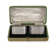 1948 AUSTRALIAN TOUR TO ENGLAND: A cased pair of silver napkin rings presented by Don Bradman to Keith Miller, both engraved "TO KEITH FROM YOUR ADMIRING SKIPPER DON BRADMAN, ENGLAND 1948". The case 16cm wide.