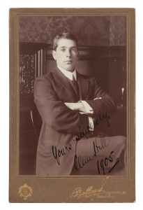 CLEM HILL (1877-1945): A sepia tone photograph laid down on a Bolland backing card. Signed, dedicated and dated 1905 by Clem Hill. 16.5 x 10.5cm overall.