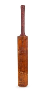 A full size Sandham bat by Strudwick, signed to the front of the blade by twelve Australians (Woodfull, Ponsford, Bradman, McCabe, Chipperfield, O'Reilly, Oldfield, Fleetwood-Smith, Bromley, Grimmett, Wall and Kippax) and the eleven Englishmen who faced each other during the 1934 Australian Tour to England. The respective signatures are headed "1934 AUSTRALIAN XI" and "ENGLAND XI". 75cm.