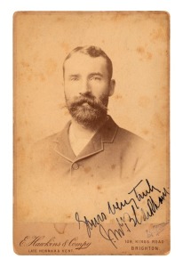 An original albumen paper photograph of Jack Blackham, laid down on an E. Hawkins & Co., cabinet card and signed and dedicated by the cricketer; circa 1890. Extremely scarce. Overall 16.5 x 10.5cm.