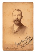 An original albumen paper photograph of Jack Blackham, laid down on an E. Hawkins & Co., cabinet card and signed and dedicated by the cricketer; circa 1890. Extremely scarce. Overall 16.5 x 10.5cm.