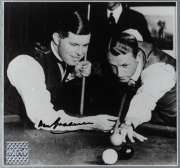 LINDRUM - BRADMAN: Attractive framed display incorporating images of Bradman and Lindrum. Of note, a photograph signed by Bradman and a vintage "Billiards and Snooker" by Walter Lindrum booklet signed by Walter Lindrum. 72 x 76cm overall. - 2