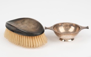 WALTER LINDRUM: Sterling silver brush emblazoned with his monogram; together with a silver tastevin presented to Walter Lindrum by Oswald Barclay in 1931. (2 items). The brush 14cm wide.