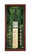 "AUSTRALIA 2004/05 FIRST XI": Display featuring a full size cricket bat signed by the whole team combined with their photographs. Accompanied by a PWC CofA, numbered 9/200. Framed in a most attractive case, 105 x 51cm overall.