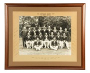 1938 AUSTRALIAN CRICKET TEAM IN GREAT BRITAIN original official large-format team photograph, signed in the side margins by all 18 in the touring party, includes Bradman, McCabe, Barnett, O'Reilly, Brown, Fingleton and Fleetwood-Smith & Barnes. Framed and - 2