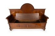 FROM WALTER LINDRUM'S BILLIARDS ROOM: An antique Australian blackwood hall bench with lift-up compartment seat and break arch back rest with recessed circular panel, circa 1920, 136cm high, 190cm wide, 54cm deep - 4