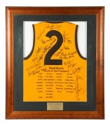 Hawthorn Football Club Team of the Century No. 2 guernsey&nbsp;signed by 20 of the team greats, including Graham Arthur, Michael Tuck, Peter Hudson, Peter Knights, Ian Law, Brendan Edwards, Kelvin Moore; attractively framed & glazed with a certificate of authe