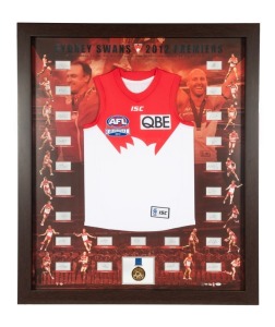 SYDNEY SWANS 2012 PREMIERS, large framed limited edition presentation featuring a Grand Final 2012 jersey, a replica Premiership medallion, and the 23 original signatures of the team members who appeared for the Swans during the Finals Series. With C of A