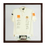 "THE AUSTRALIAN TEST MATCH SHIRT, 2002-2003" number 88 from a limited edition of 200, produced by the Australian Cricket Board, with an official Australian short sleeved shirt bearing the Australian coat-of-arms embroidered in silk, the orange sponsorship