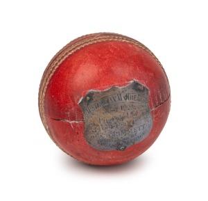 PRESENTATION "WISDEN'S SPECIAL" CRICKET BALL (1925), leather, cork and twin, mounted with a shield-shaped silver plaque, engraved "AUSTRALIAN XI v THE REST - DEC'R 1925 - Presented by HOYTS LTD TO C. GRIMMETT WINNER OF BOWLING AVERAGE." Played at the Sydney Cricket Ground, 4 - 8 December, 1925, the match pitted an Australian XI led by Bardsley against a Rest of Australia XI led by Collins. The "Rest" won by 156 runs. Grimmett's figures were 2/65 in the 1st innings and 5/91 in the 2nd.