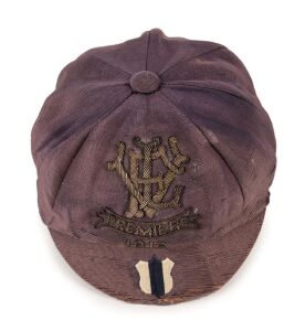CARLTON PREMIERSHIP: 1915 VFL Premiership Honour cap, faded blue (original colour at back) with wire embroidered 'VFL PREMIERS, 1915' on front panel, and blue & white shield embroidered in Carlton colours on brim; maker's label (Lincoln, Stuart & Co. Ltd., Flinders Street, Melbourne) to bright yellow internal surface which is in very good condition. Note: Only two other examples known. Provenance: From the estate of Vin Gardiner; VFL leading goal-kicker 1911; also a member of the 1908 side.