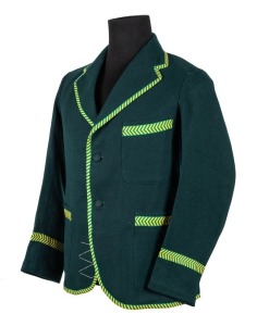 AUSTRALIAN TOUR OF ENGLAND, 1934, pure wool blazer by "Speedway" in green wool to match the Australian Test Team blazer, with green and gold trim edges and retaining the Speedway High Grade Clothing" maker's label recording Grimmett's name, measurements and order number. Although unused, these blazers were intended for the team to wear on informal occasions, while on board the ship to England, or when invited to a non-cricket event. Extremely scarce.