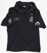 ex NATHAN BUCKLEY COLLECTION: NTFL representative side 1992. Team polo worn by Nathan Buckley around the 1992 game v Geelong. Black with NTFL logo on left breast, CUB logo on sleeves and &lsquo;NTFL v Geelong 1992 Representative&rsquo; on right breast. 2 items. - 2