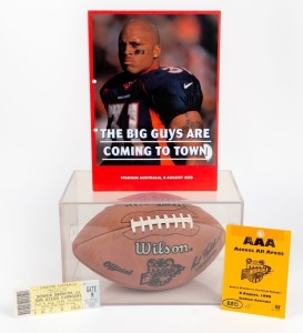 AMERICAN FOOTBALL SYDNEY 8TH AUGUST 1999: San Diego Chargers v Denver Broncos, a presentation official Wilson NFL football in perspex case, the ball emblazoned with logo featuring Australian flag and the date and location of the game, the only instance of an NFL game being played in Australia; accompanied by publicity material prepared for the 'Weekend of Football' in Sydney, a ticket to the game, an access pass, and a card expressing appreciation for the vendor's work, advice, and guidance.