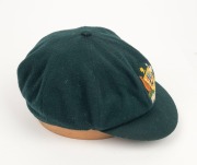 CLARRIE GRIMMETT'S AUSTRALIAN&nbsp;"BAGGY GREEN" PRESENTATION&nbsp;TEST CAP: Green wool, with embroidered coat-of-arms that differs that differs from the usual design. This cap bears the official Australian coat-of-arms as set out in the 1912 Royal Warrant. It show - 3