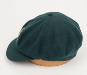 CLARRIE GRIMMETT'S AUSTRALIAN&nbsp;"BAGGY GREEN" PRESENTATION&nbsp;TEST CAP: Green wool, with embroidered coat-of-arms that differs that differs from the usual design. This cap bears the official Australian coat-of-arms as set out in the 1912 Royal Warrant. It show - 5