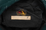 CLARRIE GRIMMETT'S AUSTRALIAN&nbsp;"BAGGY GREEN" PRESENTATION&nbsp;TEST CAP: Green wool, with embroidered coat-of-arms that differs that differs from the usual design. This cap bears the official Australian coat-of-arms as set out in the 1912 Royal Warrant. It show - 7