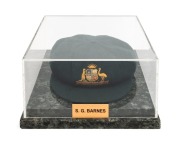 THE 1948 AUSTRALIAN TEST TEAM BAGGY GREEN CAP WORN BY SID BARNES: Green wool with embroidered Coat of Arms and 1948 to the front panel; Farmer's, Sydney label to the internal peak with "S. G. Barnes" added in manuscript. Overall in very good condition wit