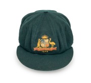THE 1948 AUSTRALIAN TEST TEAM BAGGY GREEN CAP WORN BY SID BARNES: Green wool with embroidered Coat of Arms and 1948 to the front panel; Farmer's, Sydney label to the internal peak with "S. G. Barnes" added in manuscript. Overall in very good condition wit - 2