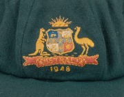 THE 1948 AUSTRALIAN TEST TEAM BAGGY GREEN CAP WORN BY SID BARNES: Green wool with embroidered Coat of Arms and 1948 to the front panel; Farmer's, Sydney label to the internal peak with "S. G. Barnes" added in manuscript. Overall in very good condition wit - 3