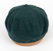 THE 1948 AUSTRALIAN TEST TEAM BAGGY GREEN CAP WORN BY SID BARNES: Green wool with embroidered Coat of Arms and 1948 to the front panel; Farmer's, Sydney label to the internal peak with "S. G. Barnes" added in manuscript. Overall in very good condition wit - 5