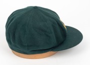 THE 1948 AUSTRALIAN TEST TEAM BAGGY GREEN CAP WORN BY SID BARNES: Green wool with embroidered Coat of Arms and 1948 to the front panel; Farmer's, Sydney label to the internal peak with "S. G. Barnes" added in manuscript. Overall in very good condition wit - 6