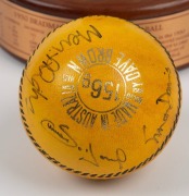 An Australian cricket tie, circa 1985; together with a Don Bradman presentation cricket ball, limited edition 501/974, a signed yellow cricket and a signed kookaburra cricket ball on stand, (4 items) - 3
