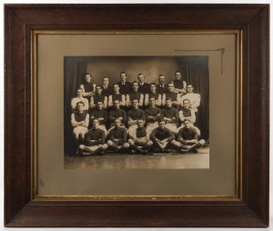 PRAHRAN A.J.M. (JAM FACTORY), 1917 Premiers, black and white team photograph in original oak frame with gilt slip and glass, ​​​​​​​with pencil inscription verso, sheet size 31 x 40cm, 60 x 70cm overall