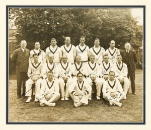 THE 1938 AUSTRALIAN TEST TEAM IN ENGLAND: An original photograph of the sixteen players and two officials who made up the touring party led by Don Bradman (Captain) and including Bill Brown, Stan McCabe, Bill O'Reilly and Lindsay Hassett. The photograph is signed in ink by all sixteen players. Framed and glazed, overall 42 x 44cm.