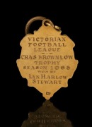 THE 1965 BROWNLOW MEDAL, 9ct gold, blue enamel; engraved verso "VICTORIAN FOOTBALL LEAGUE - CHAS BROWNLOW TROPHY - SEASON 1965 WON BY IAN HARLOW STEWART" - 4