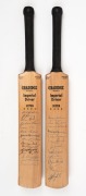 1966-67 AUSTRALIA IN SOUTH AFRICA: A pair of miniature Gradidge "Imperial Driver" souvenir bats; one signed by the Australian team (led by Bob Simpson and Bill Lawry); the other signed by the South African team (lead by Peter van der Merwe and Eddie Barlo