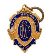 THE 1965 BROWNLOW MEDAL, 9ct gold, blue enamel; engraved verso "VICTORIAN FOOTBALL LEAGUE - CHAS BROWNLOW TROPHY - SEASON 1965 WON BY IAN HARLOW STEWART"
