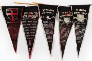 A collection of ST.KILDA supporters' pennants: "1963 ST. KILDA SEMI FINALISTS COACH A. JEANS", "ST. KILDA SEMI FINALISTS 1965", "ST. KILDA 1965 GRAND FINAL" (featuring Ian Stewart), "ST. KILDA GRAND FINAL" (featuring Darrel Baldock) and "1966 ST. KILDA GRAND FINALISTS". (Total: 5).