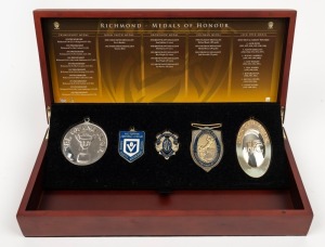 RICHMOND MEDALS OF HONOUR: Set of replica Grand Final/Norm Smith/Brownlow/John Coleman/Jack Dyer medals in timber presentation box.