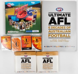 Group of eighteen AFL items - one Footy 2011 3D collectors cards album with two 3D viewers and 221 cards, four 2010s sealed AFL Umpires trading card decks, and one 'Ultimate AFL 6 Decades of Australian Football Past Glories - Future Ambitions' DVD album t