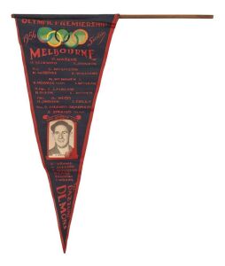 1956 MELBOURNE OLYMPIC PREMIERSHIP Souvenir pennant which incorporates the Olympic rings, the Melbourne team list and an applied photo of the team captain, Noel McMahen. Extremely rare. The only other example known to us is held in the Australian Sports Museum at the MCG.