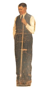 WALTER LINDRUM chromolithograph vintage cardboard cutout, near life size, 164cm high; Together with a framed photograph of the cutout and Dolly Lindrum playing billiards in the billiard room at the Albert Park house, overall 45 x 55cm. (2 items).