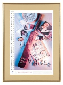March 1993 calendar poster featuring Don Bradman's career, with original signature and dedication from Don Bradman; framed & glazed, overall 80 x 58cm.