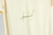 "SHANE WARNE 500 TEST WICKETS" Commemorative Shirt: an Australian Test team short-sleeved shirt with the Australian logo and Warne's team number "350" embroidered in silk together with Travelex sponsorship logos, and signed by Shane Warne; attractively pr - 2